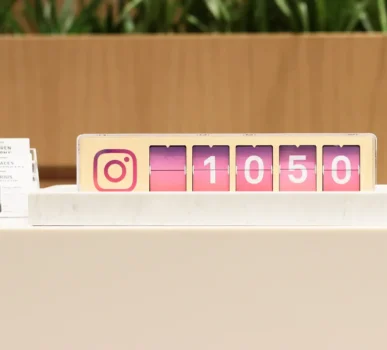 An instagram clock sitting on top of a table.